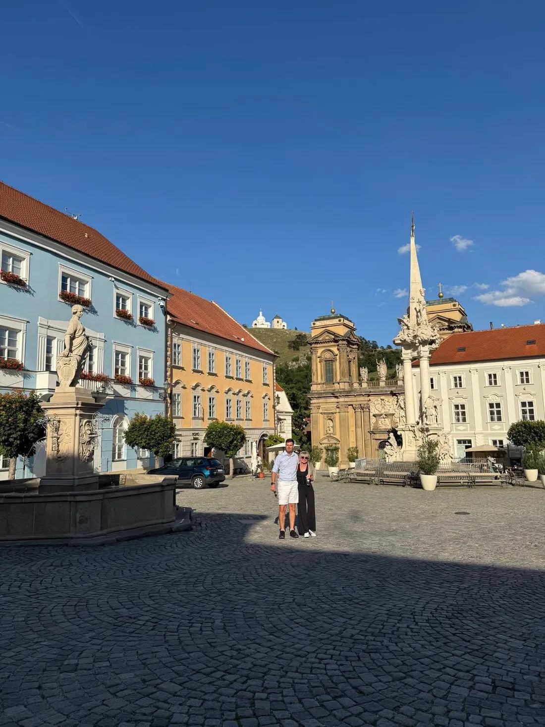A sunlit town square in Moravian wine country